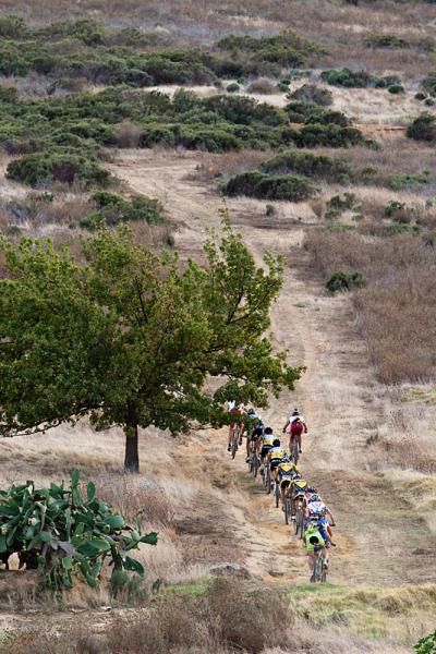 The leaders ride together during stage four
