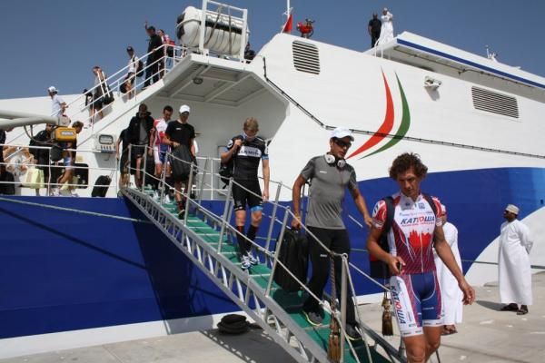 The riders disembark before the 209km stage