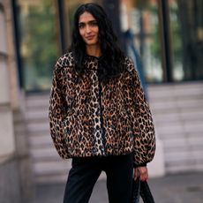 a guest attends london fashion week spring summer 2025 shows wearing leopard print jacket 