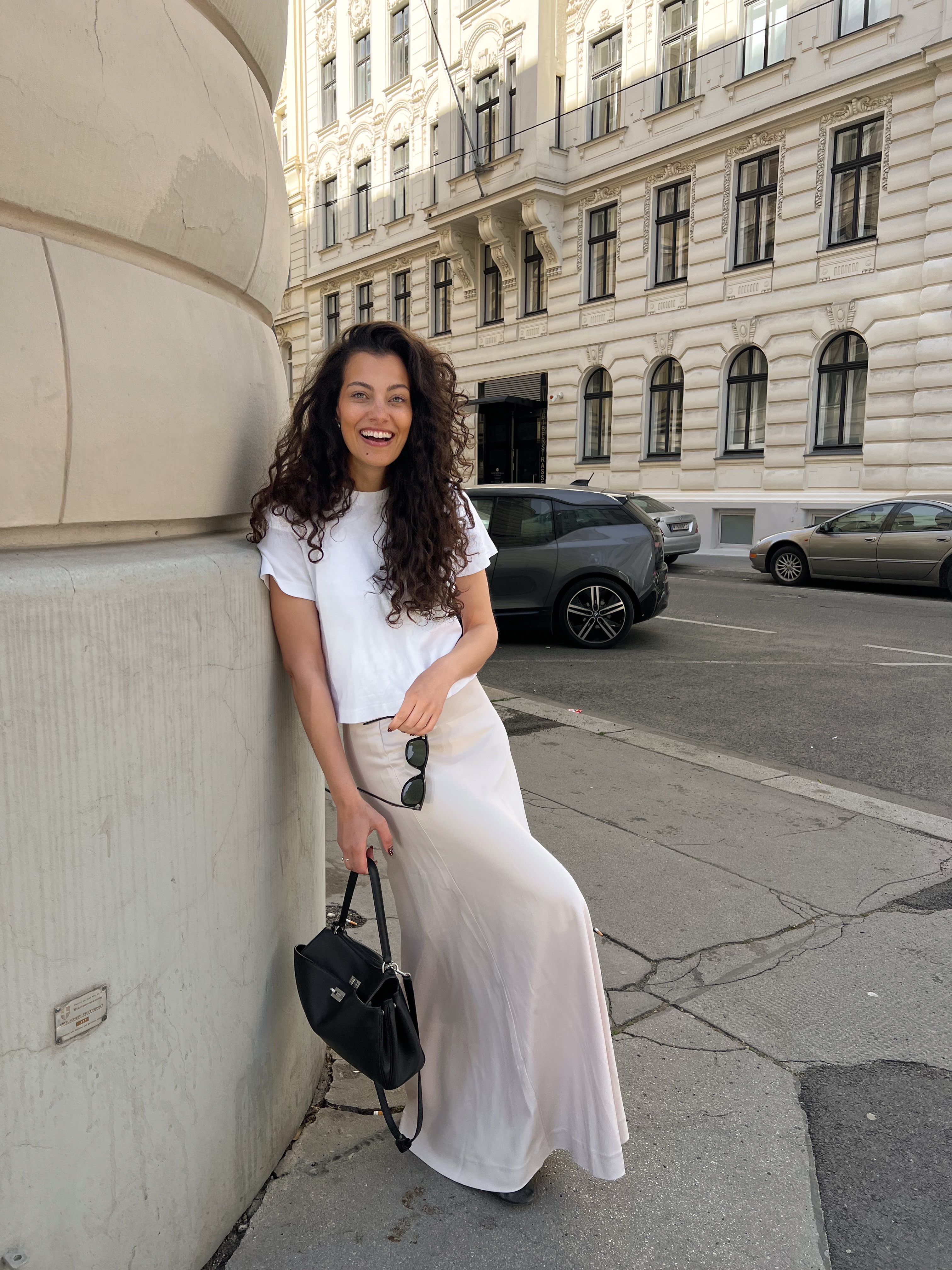 An image of a woman wearing best off white skirt for summer