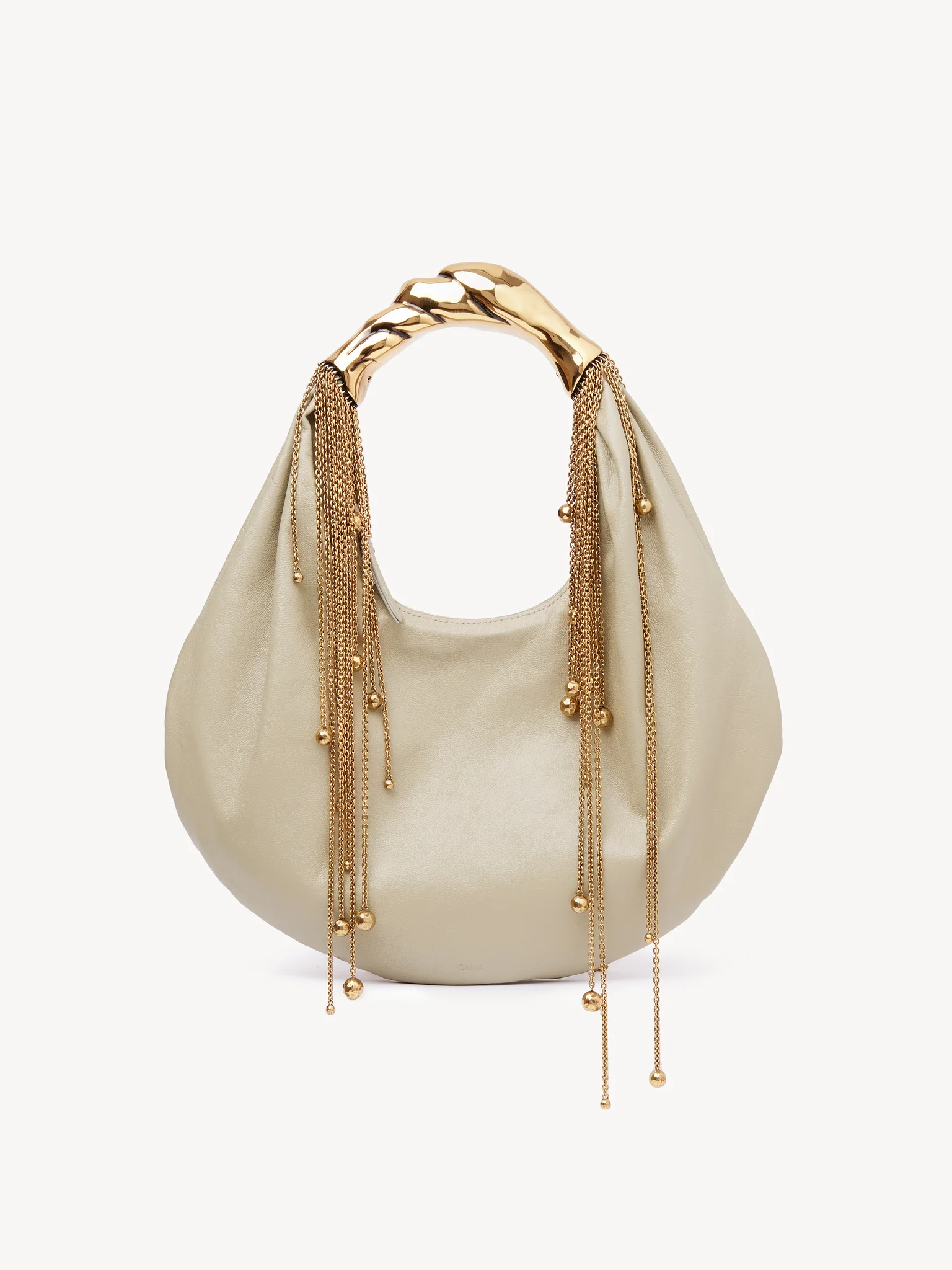 Shiny leather twisted shell hoobo bag