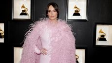 Kacey Musgraves on the red carpet in pink fluffy coat