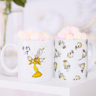 white printed mug with marshmallows on white table