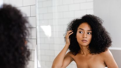 Hair, Face, Hairstyle, Black hair, Skin, Beauty, Long hair, Afro, Human, Lip, 