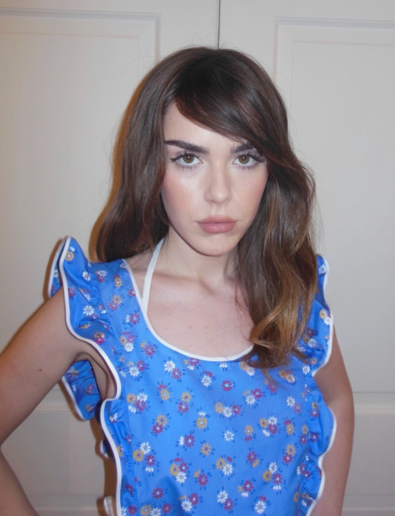 An image of Kiernan Shipka with side-swept bangs.