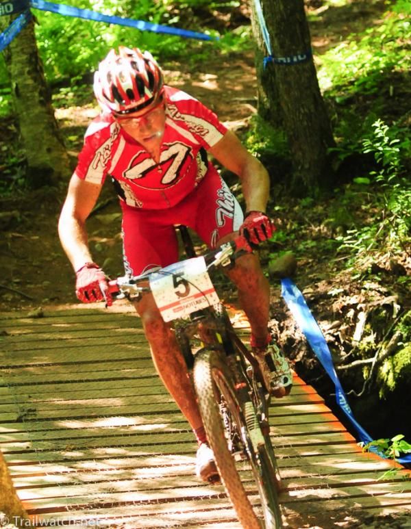 Mathias Stirnemann (Thoemus Racing) crossing one of the wooden bridges