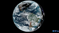 an image of earth taken by a satellite, showing white wispy clouds over blue oceans and green landmasses