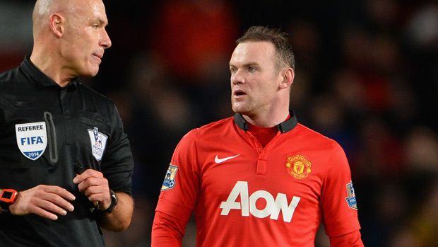 Wayne Rooney and Howard Webb