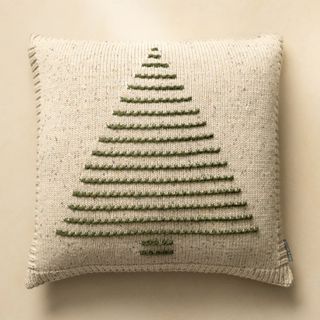 neutral knit cover with green christmas tree shape