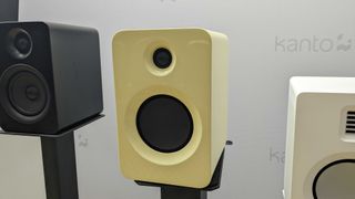 Kanto Audio Ren in light yellow, in a hi-fi room