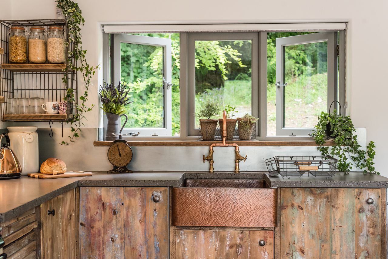 copper kitchen belfast sink in rustic kitchen