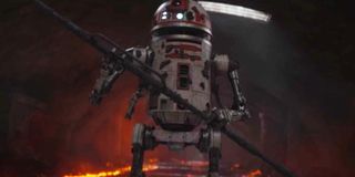 An astromech droid looks menacing in episode 8 of "The Mandalorian."