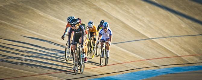Sprinter Tela Crane leads the Woman's field in the Miss and Out race