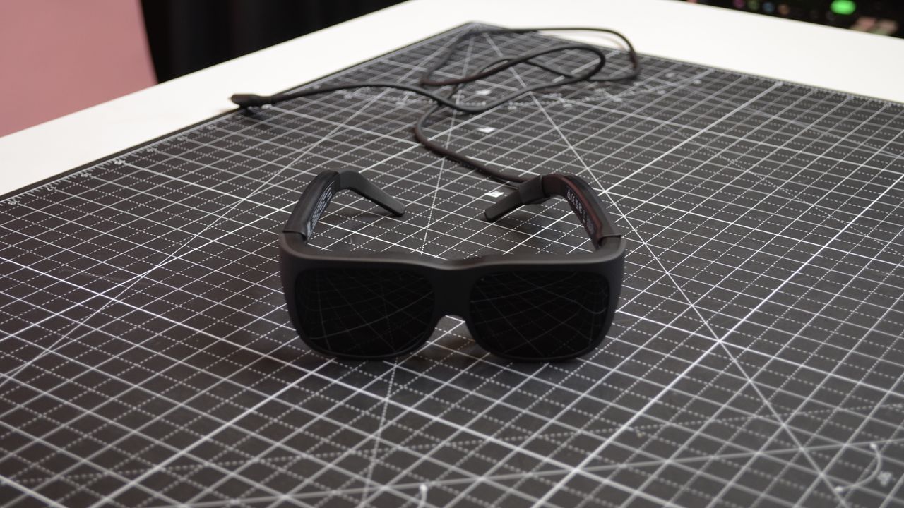 Lenovo Legion Glasses on table