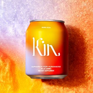 A can of Kin alcohol on a colourful background.