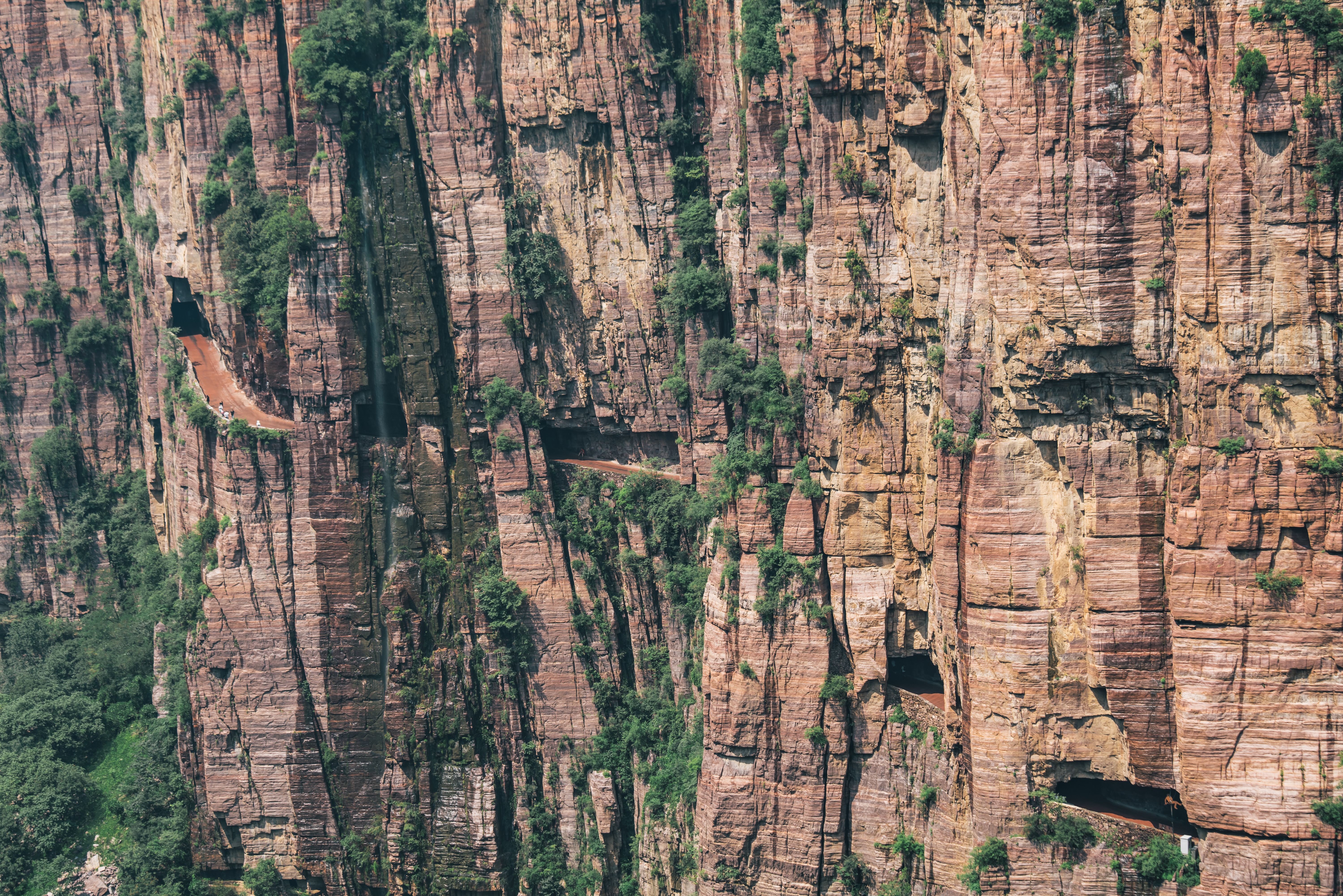 A side view of the Guoliang Tunnel carved through a Chinese mountain