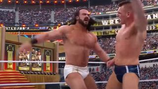 Drew McIntyre and Gunther beating the mess out of one another at WrestleMania