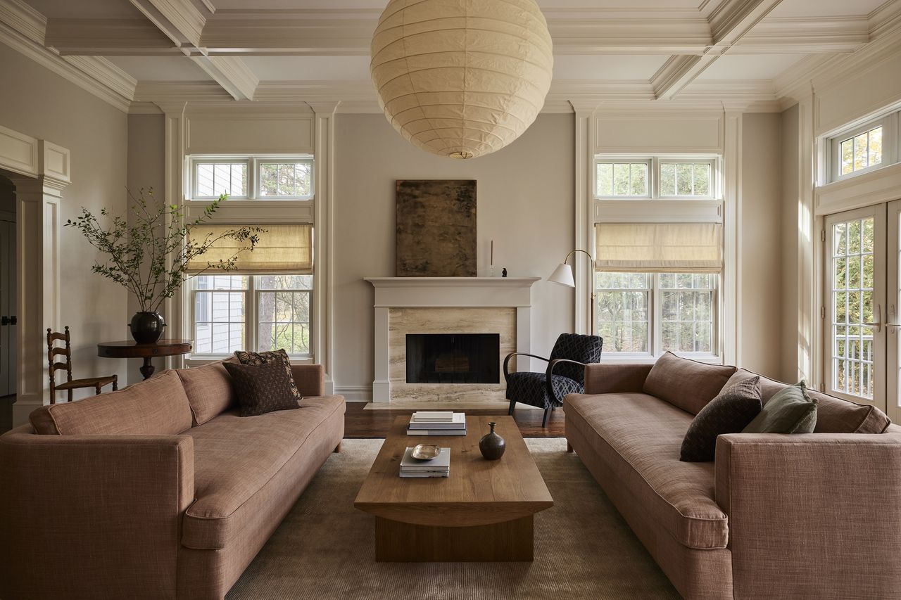 A living room painted in a light warm grey