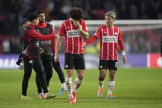 PSV players with their head in their hands