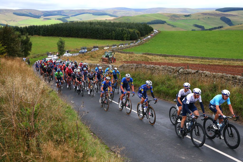 EDINBURGH SCOTLAND SEPTEMBER 11 LR Mark Cavendish of United Kingdom Tim Declercq of Belgium Mikkel Honor of Denmark and Team Deceuninck QuickStep Mason Hollyman of United Kingdom Daniel Martin of Ireland and Team Israel StartUp Nation Michael Woods of Canada and Team Israel StartUp Nation turquoise points jersey and The Peloton compete during the 17th Tour of Britain 2021 Stage 7 a 1948km stage from Hawick to Edinburgh TourofBritain TourofBritain on September 11 2021 in Edinburgh Scotland Photo by Alex LiveseyGetty Images