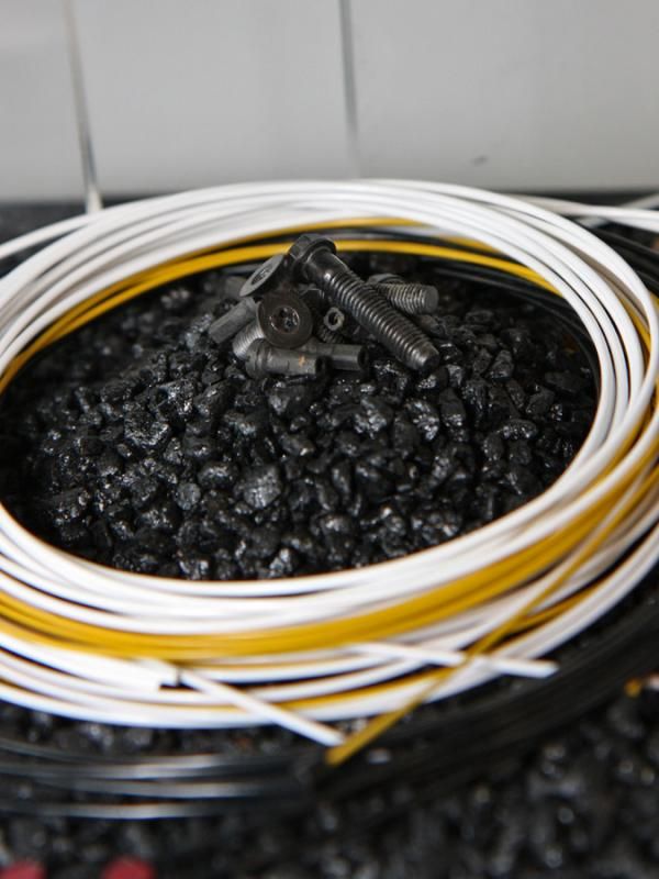 Carbon fiber bolts? Non-metallic fiber cables? Both are avaiable for inspection at Fairwheel Bikes' new gallery.