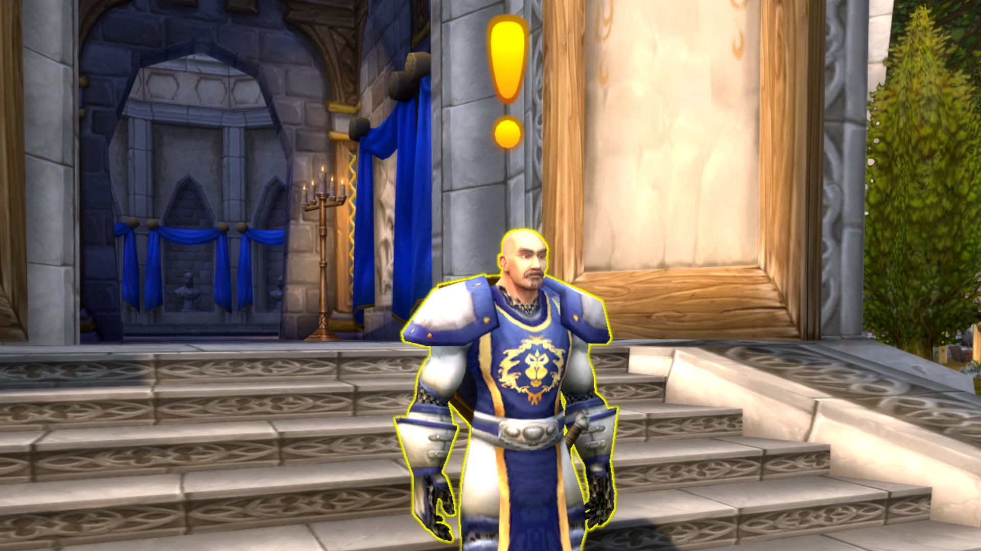 Marshal McBride in World of Warcraft stands outside Northshire Abbey, poised to deliver a quest to the player.