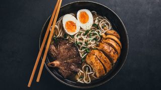 Ramen in bowl with chopsticks