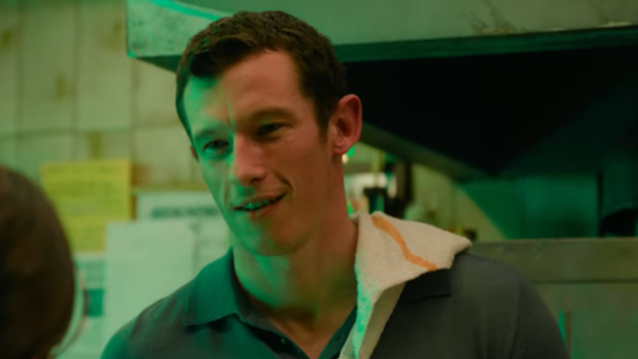 Callum Turner looking forward with a towel over his shoulder in One Night Only.