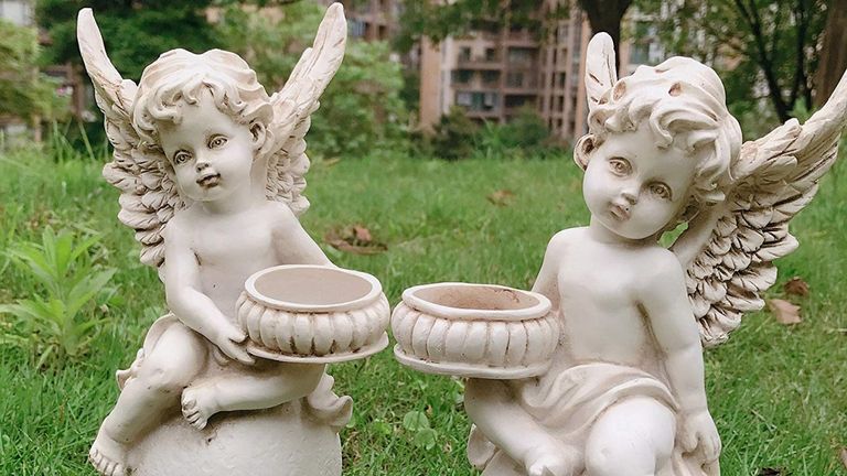 garden ornaments: stone effect garden cherubs