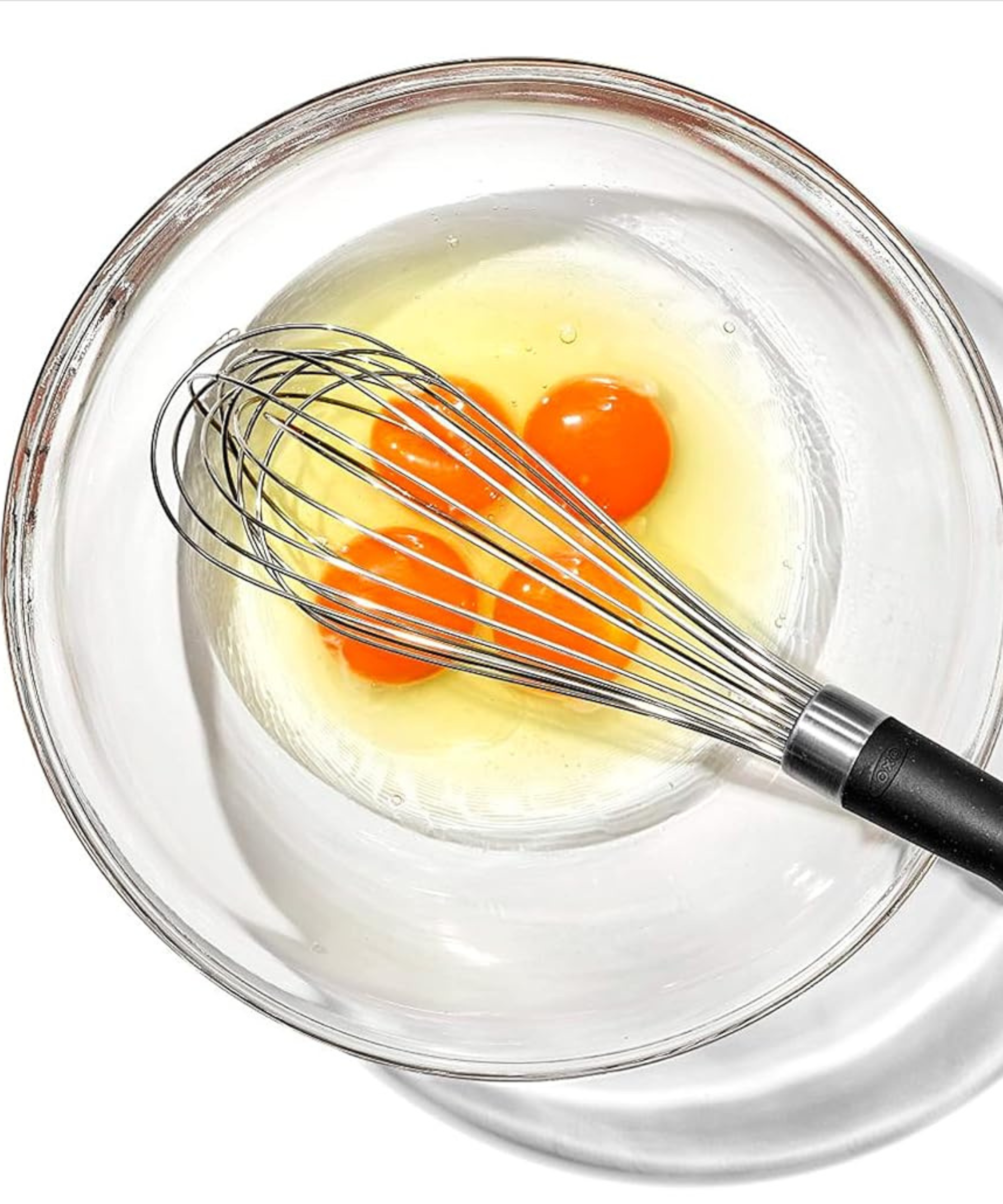 OXO good grips whisk mixing egg yolks