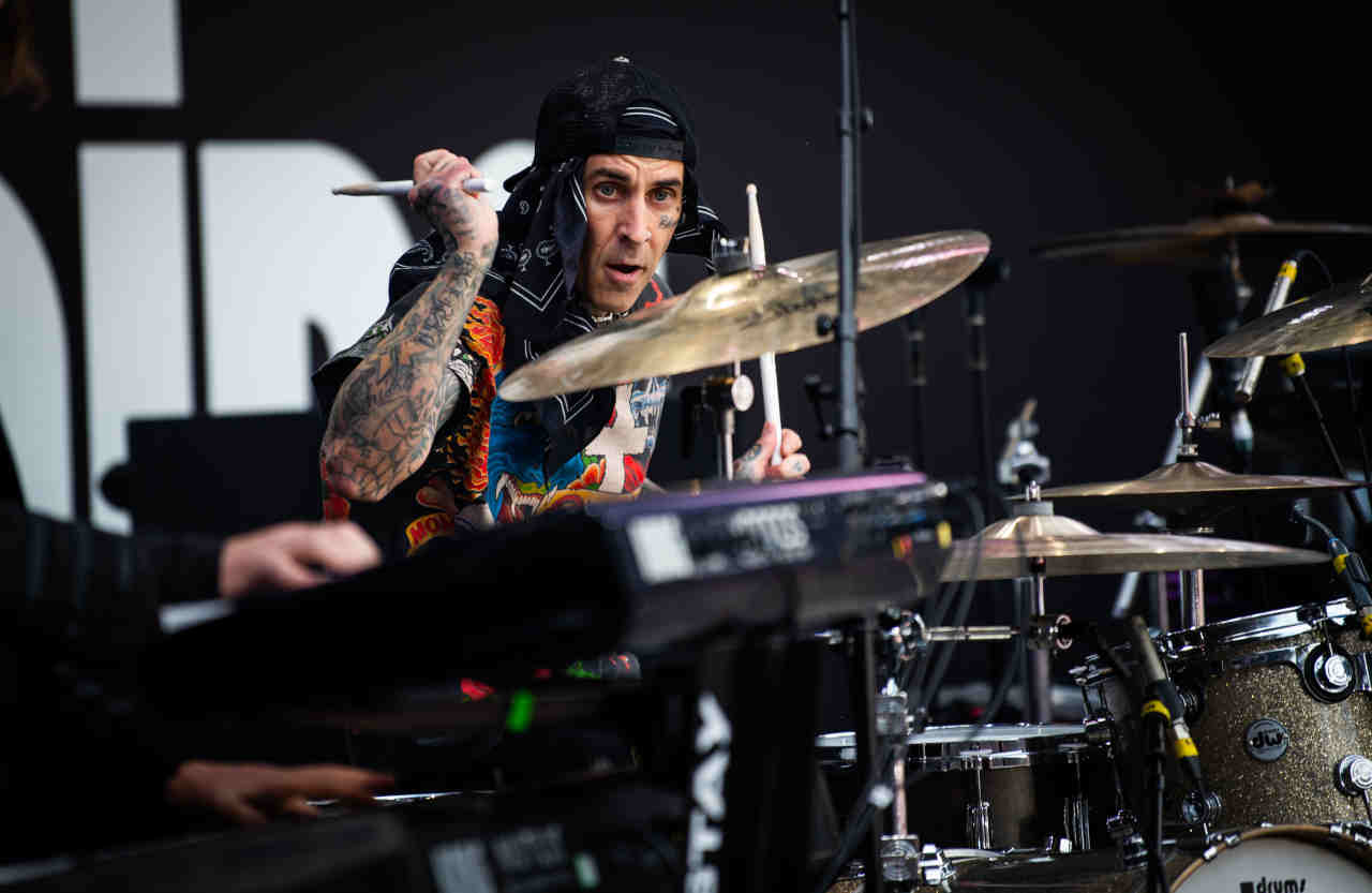 Blink-182&amp;rsquo;s Travis Barker performing onstage at the Back To The Beginning show at Villa Park in July 2025