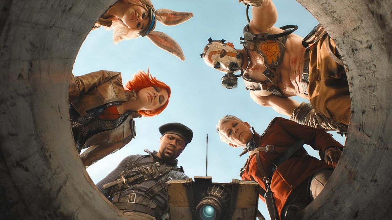 Five humans and a robot look down a well