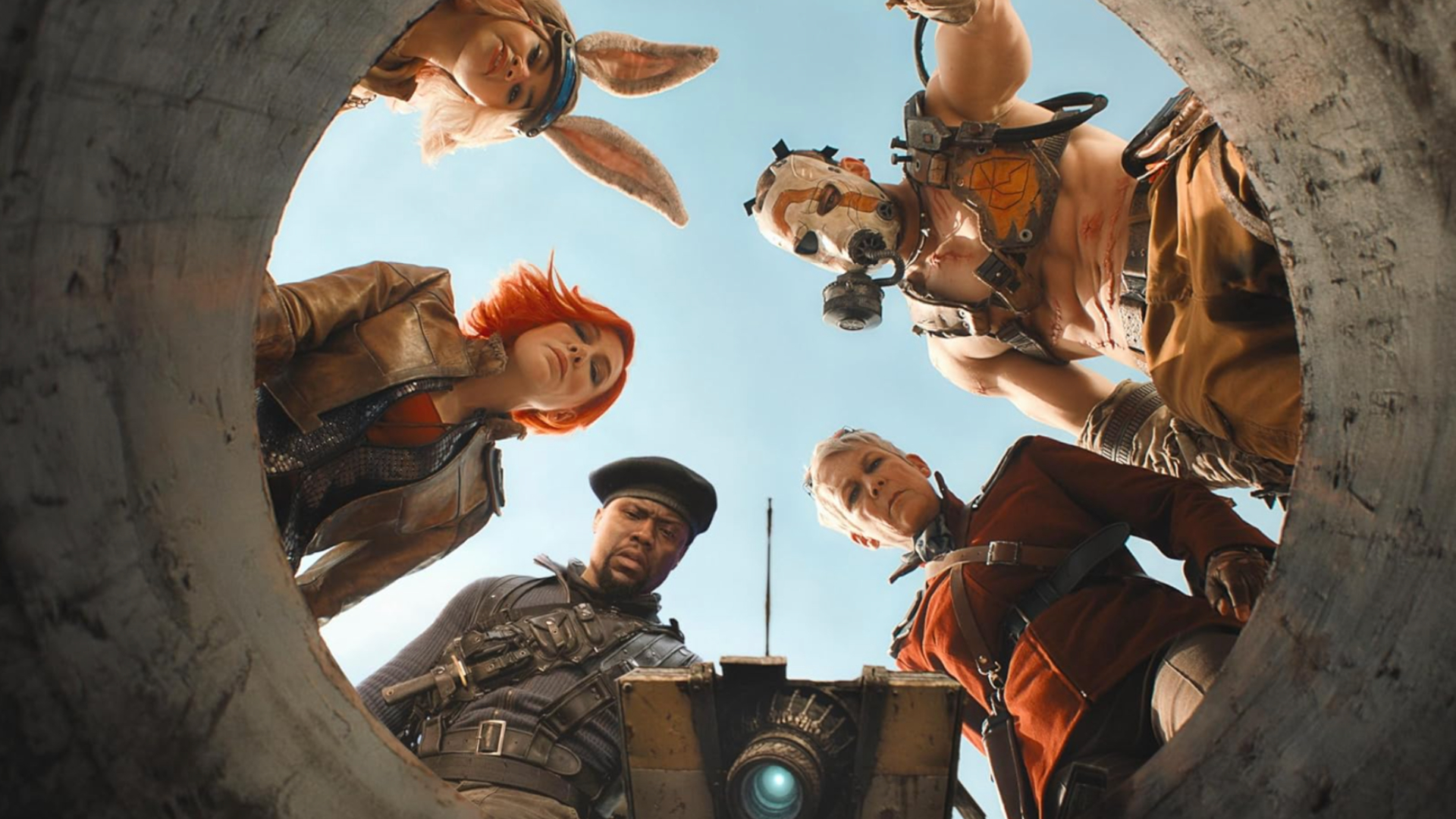 Five humans and a robot look down a well 