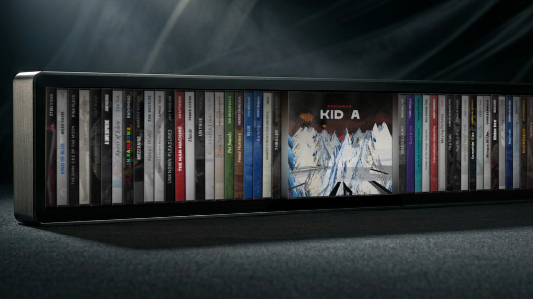 A close up of the Spine Music display with a row of album spines