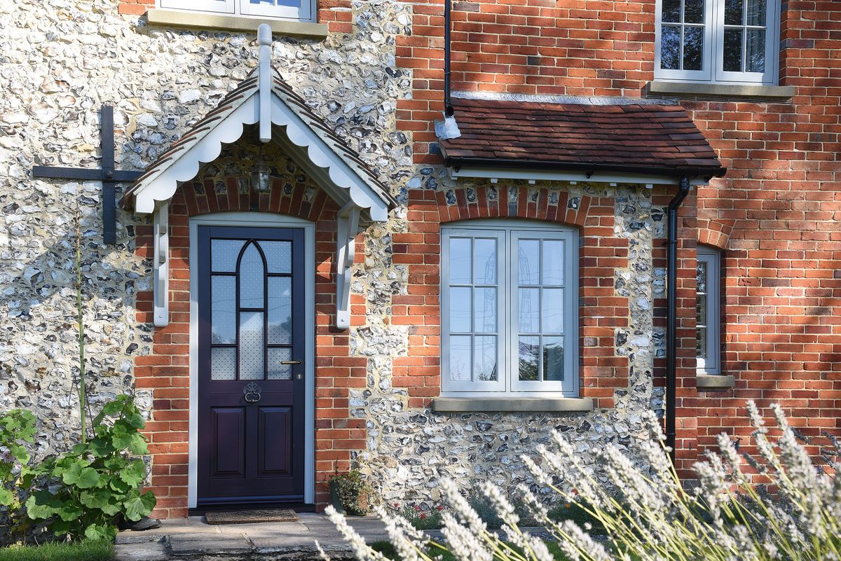 Elegant black and red front doors, Greater London, England, UK