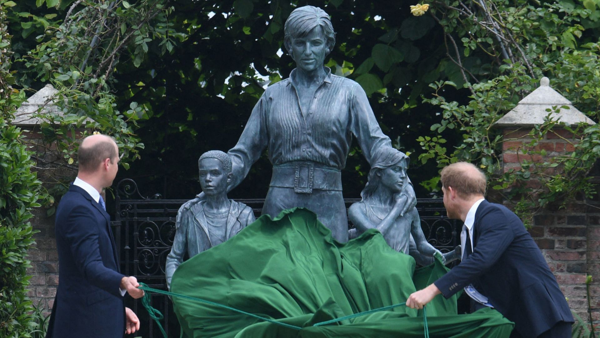 Prince William and Prince Harry unveil a statue of their mother, Princess Diana at The Sunken Garden in Kensington Palace, London on July 1, 2021