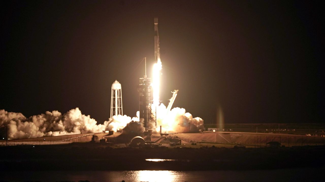 A rocket carrying the IXPE spacecraft lifts off in Florida.