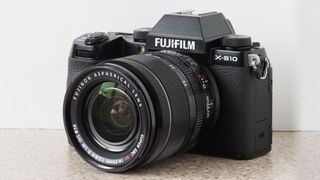 The Fujifilm X-S10 on a plain white background