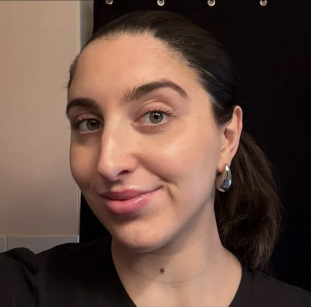 a girl with brown hair before using the Versed Skin Solution Multi-Serum Skin Tint Foundation.
