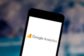 Google Analytics logo displayed on a smartphone