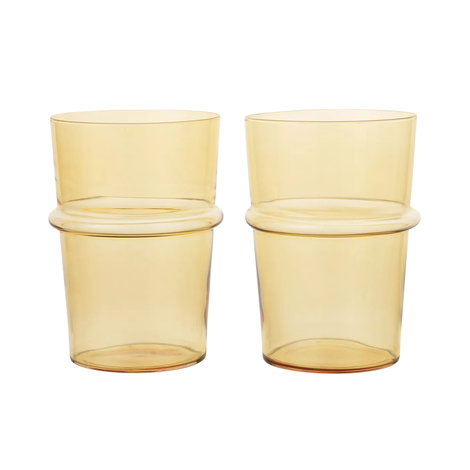 A pair of clear yellow glass tumblers