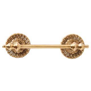 A patterned gold horizontal door handle