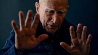 Sebastiao Salgado poses for a portrait for AFP at Somerset House in London on April 18, 2024