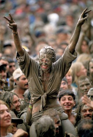 A mud-covered fan at Woodstock 1994