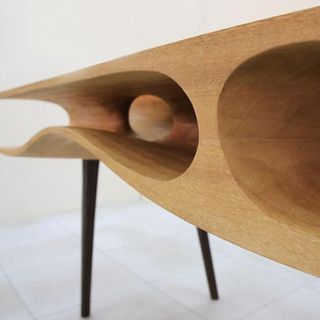 wooden desk with curved contours