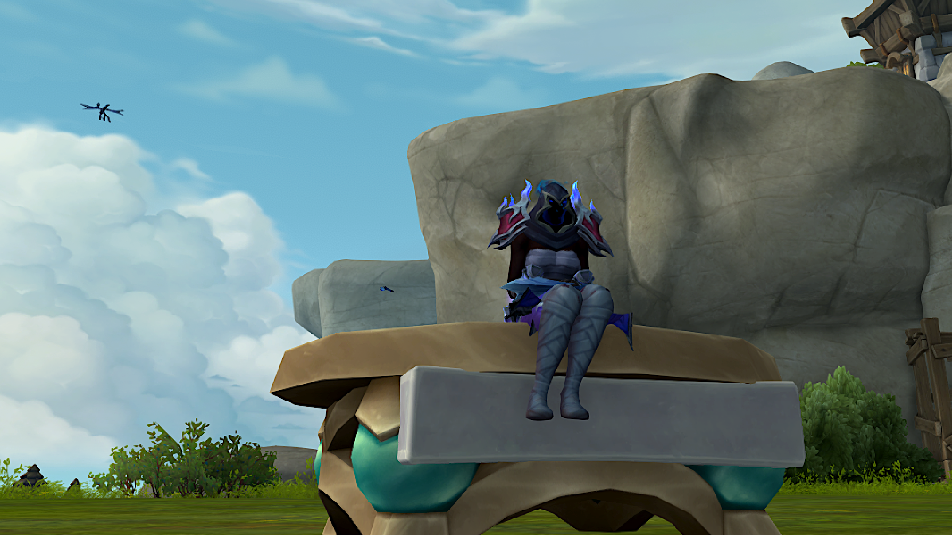 A character sits on a table in World of Warcraft.