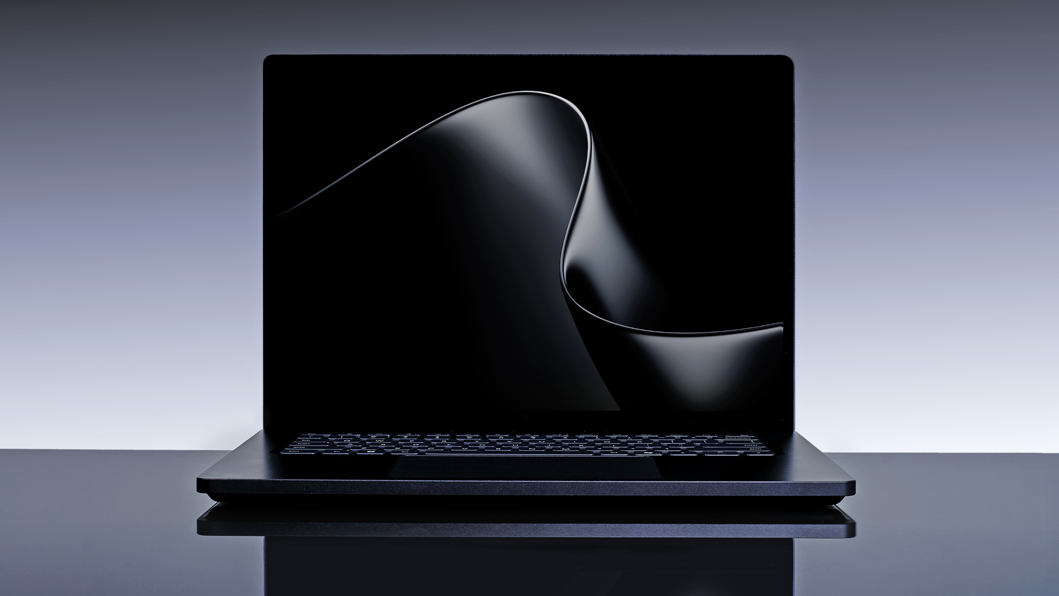 Surface Laptop Ultra with a dark, elegant design sits against a light background, creating a futuristic and stylish atmosphere.
