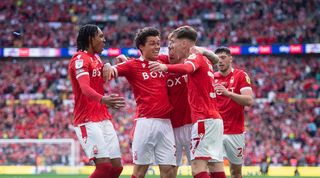 Nottingham Forest players celebrate against Huddersfield at Wembley.