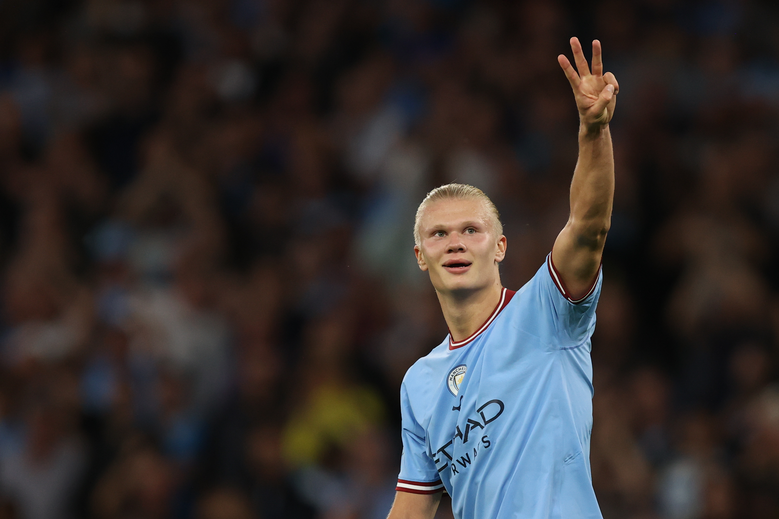 Erling Haaland celebrates after scoring a hat-trick for Manchester City against Nottingham Forest in August 2022.