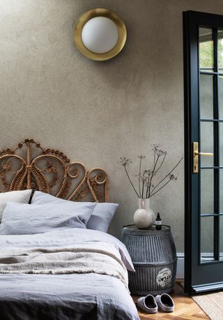 Rustic grey bedroom with dove grey bed linen